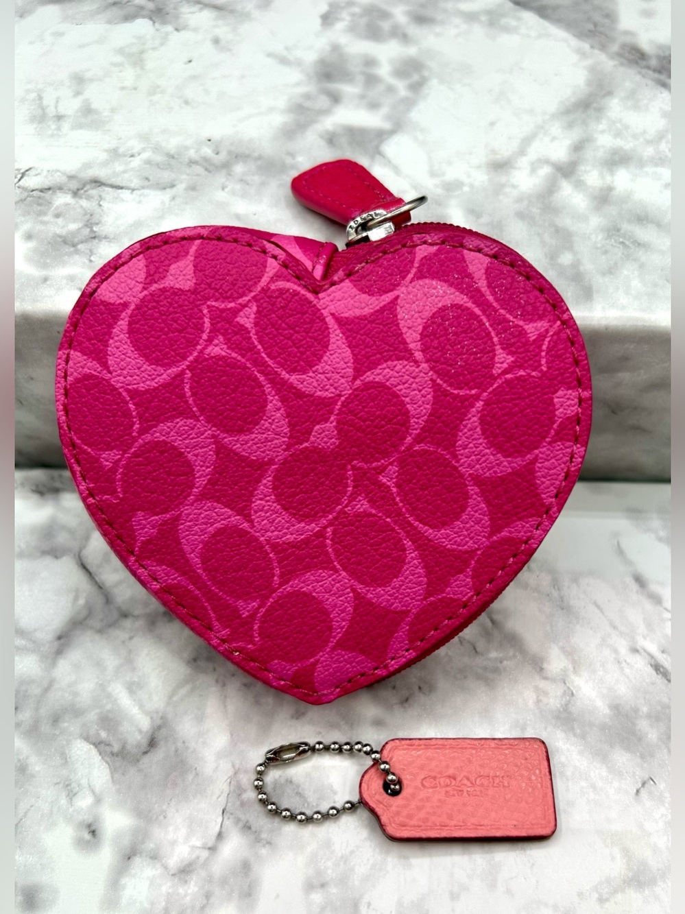 COACH Heart-Shaped Coin Pouch in a Bright Pink Signature Leather.